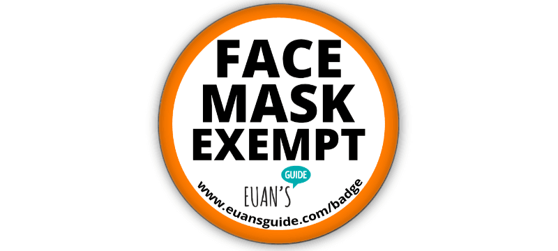 A Face Mask Exempt badge from Euan's Guide. The badge is round with an orange outline.