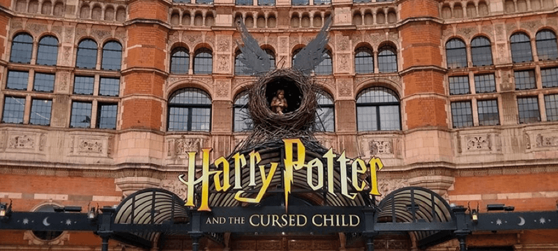 Exterior of Palace Theatre with a Harry Potter display above door