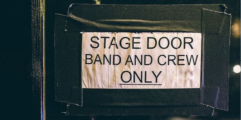 Image of a stage door sign