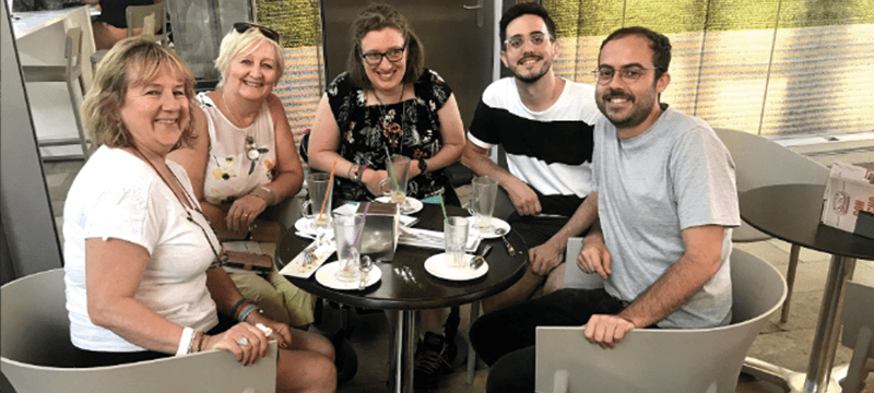 Image of: Zoe drinking Horchata with friends