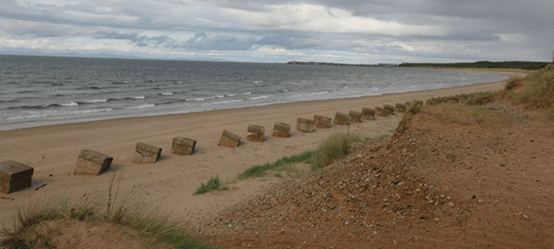 Image of beach and water on an overcast day